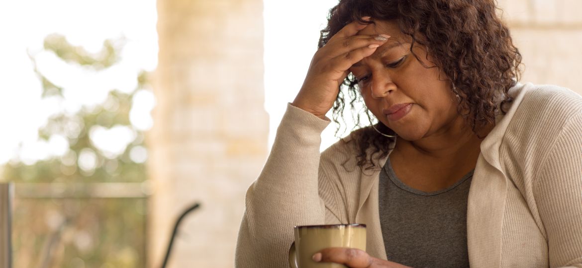 African American middle age woman looking sad.